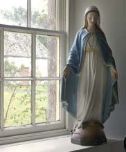 Statue of the Virgin Mary in the Chapel window